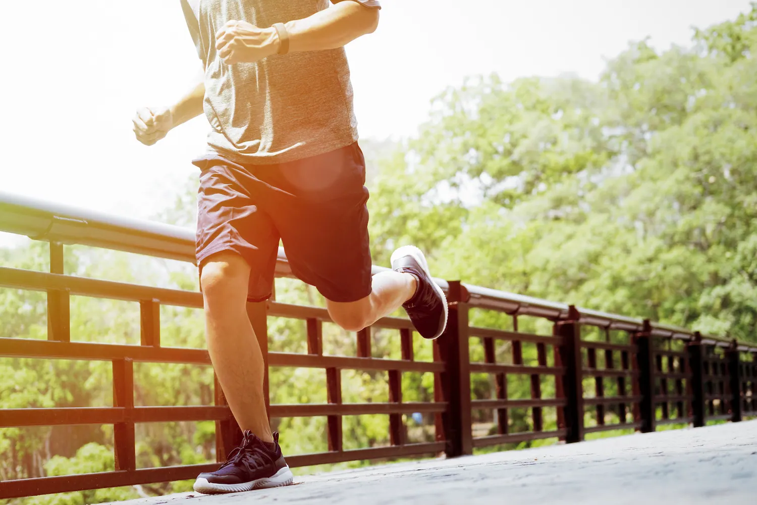 a man jogging around the bridge