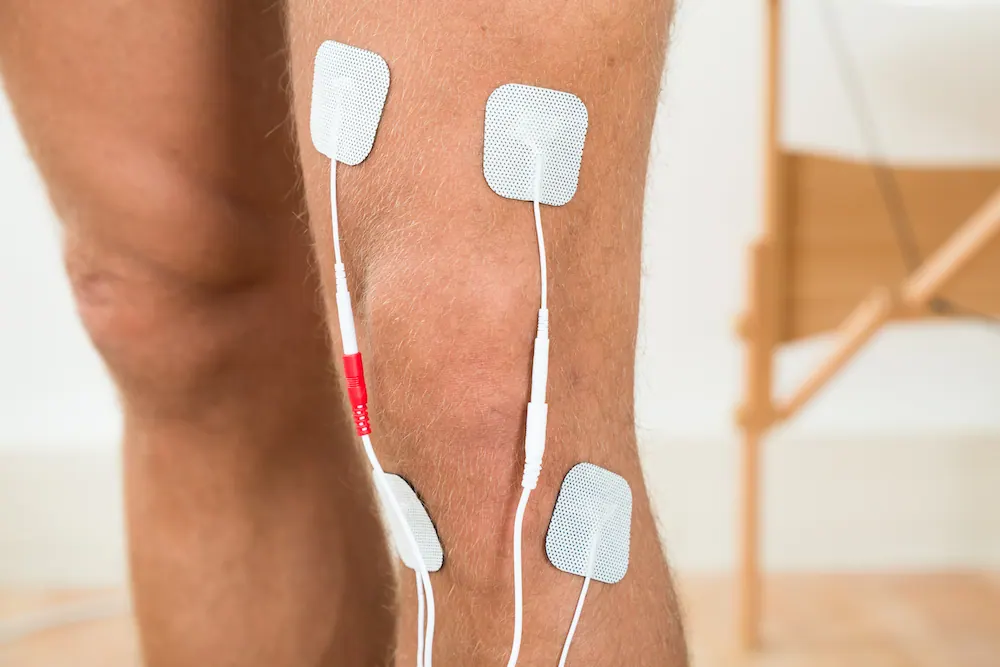 electrotherapy on the legs