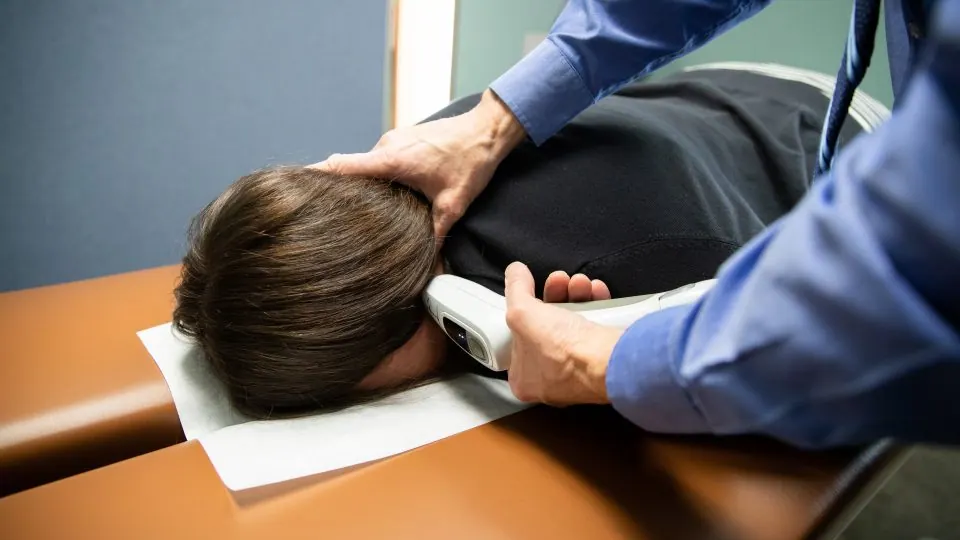 a woman having a activator adjustment