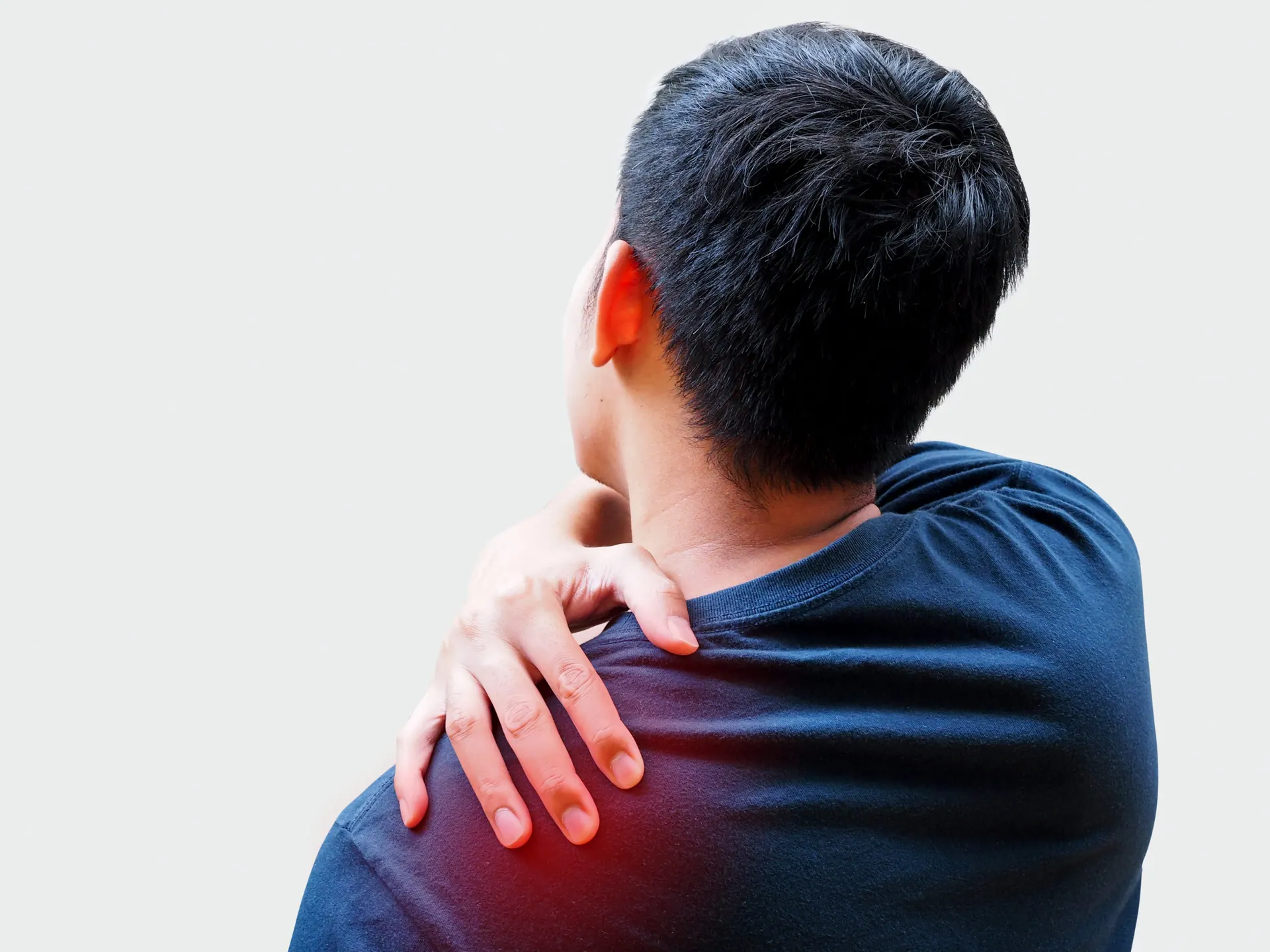 a man suffering from shoulder pain