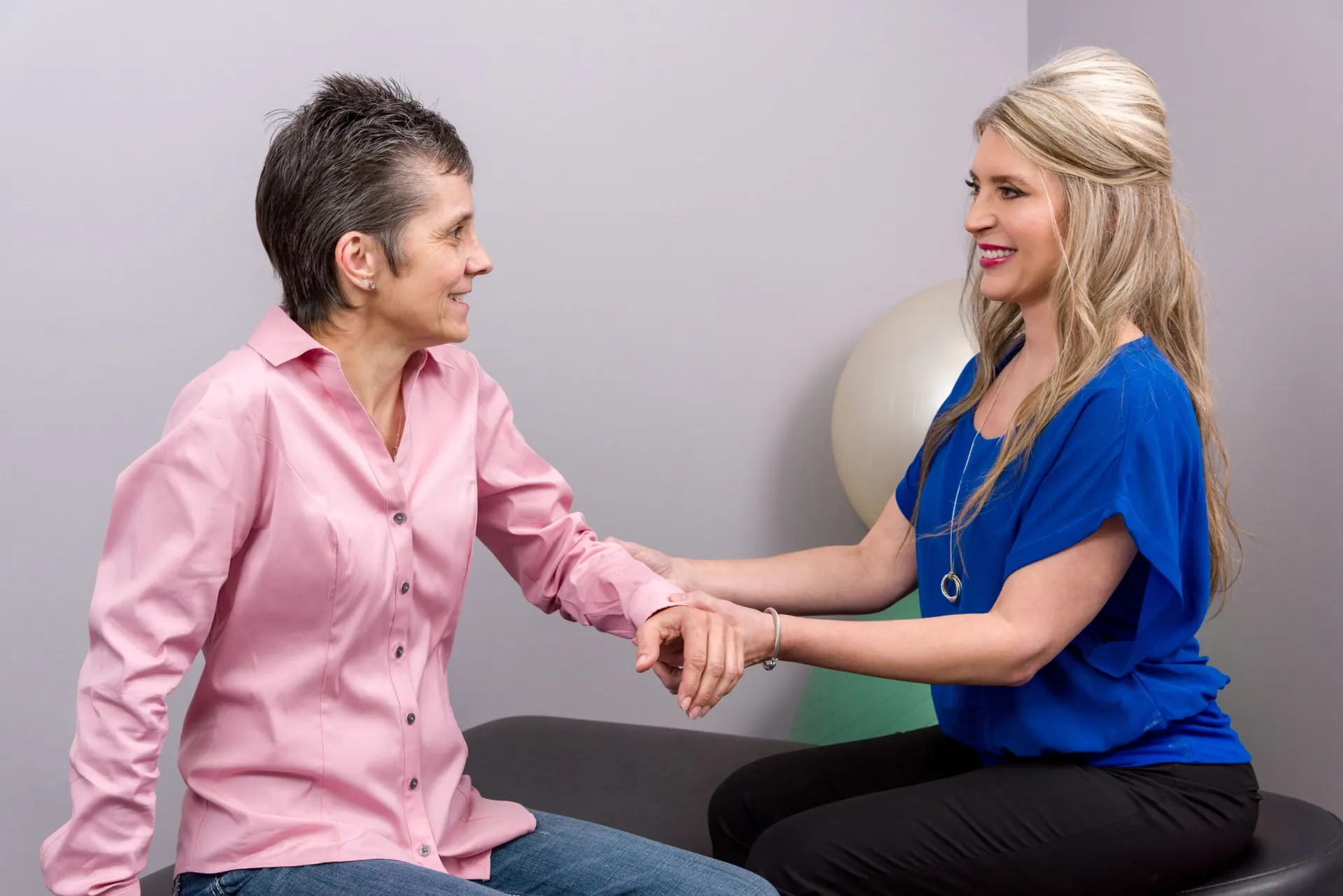 Dr Stacey Rodger giving her patient a arm care