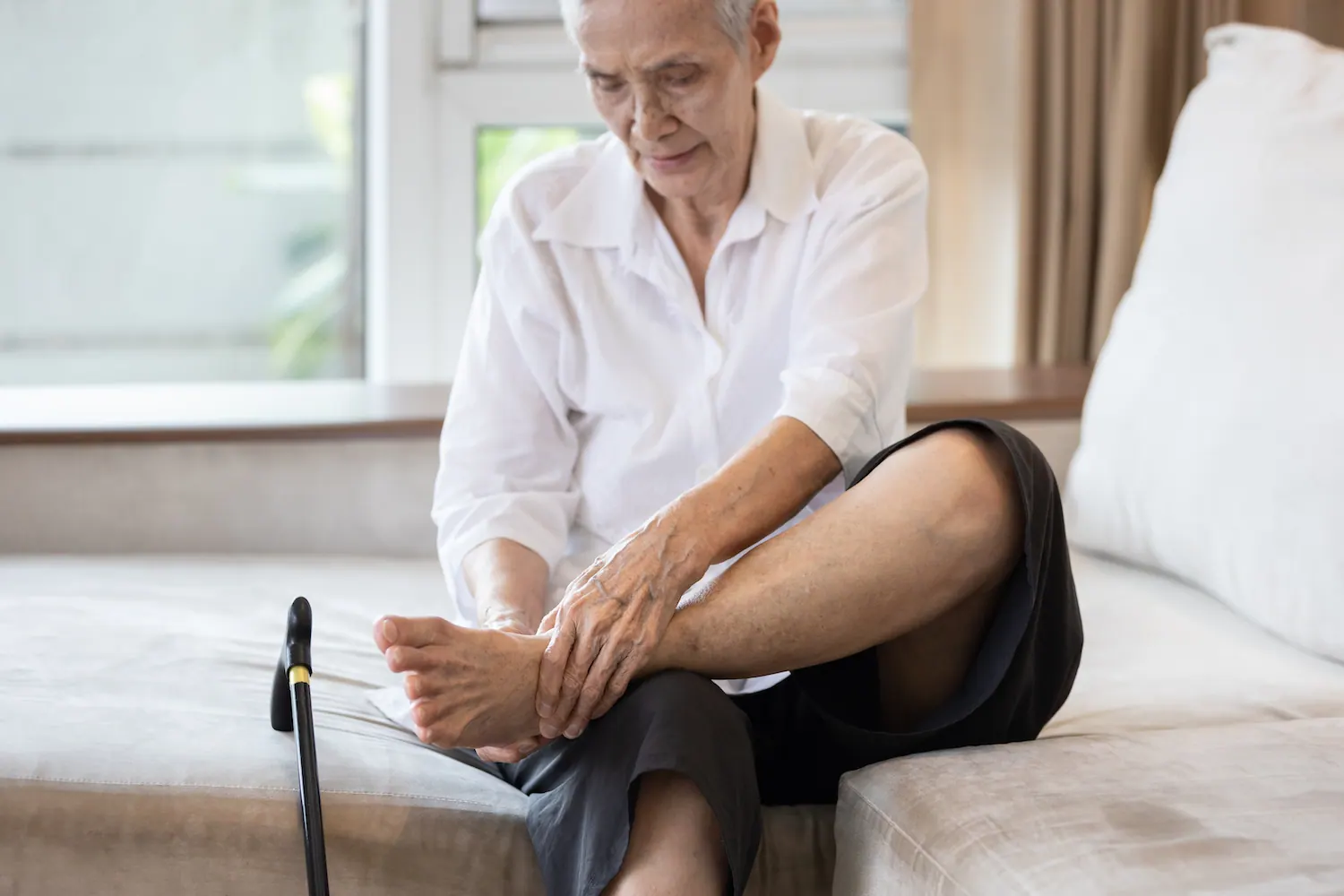 a old man suffering from neuropathy